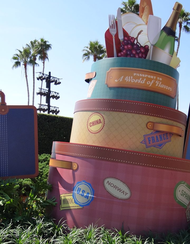 Passport to a World of Flavors luggage-stack display with country stamps